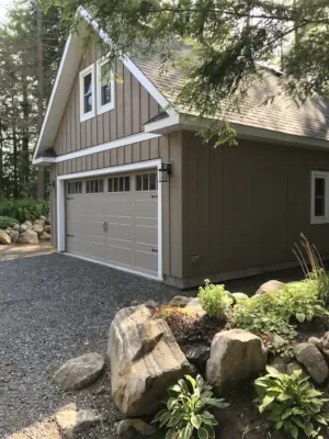 A new garage was built to match the renovated cottage and will house the family boat during the off-season.