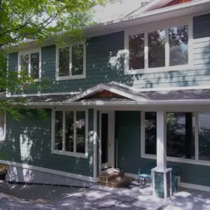 Western Red Cedar shingles finish the decorative gable over this Muskoka home's entry.