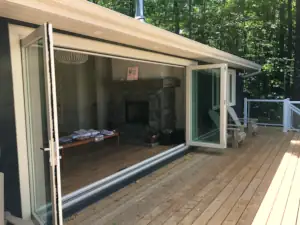 Large bifolding doors ensure that summer breezes can cool the home interior after hot, sunny afternoons.