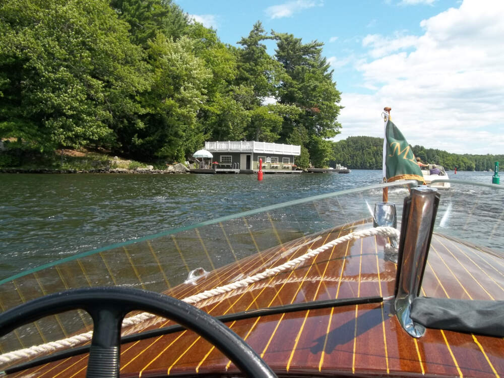 Boats navigating the buoys on the Joseph River on the way to Lake Muskoka near Port Carling, Ontario.
